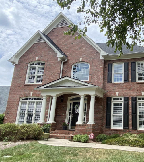 Home with green lawn