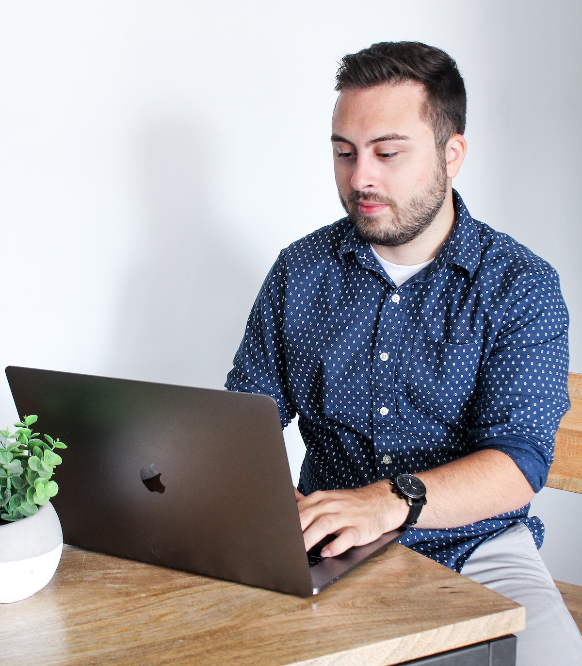 A man at a laptop