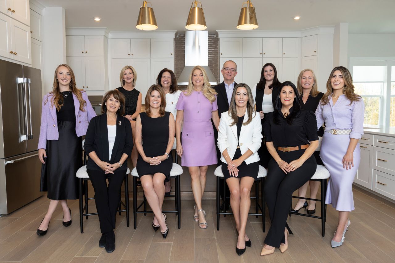 resized photo of team in kitchen 