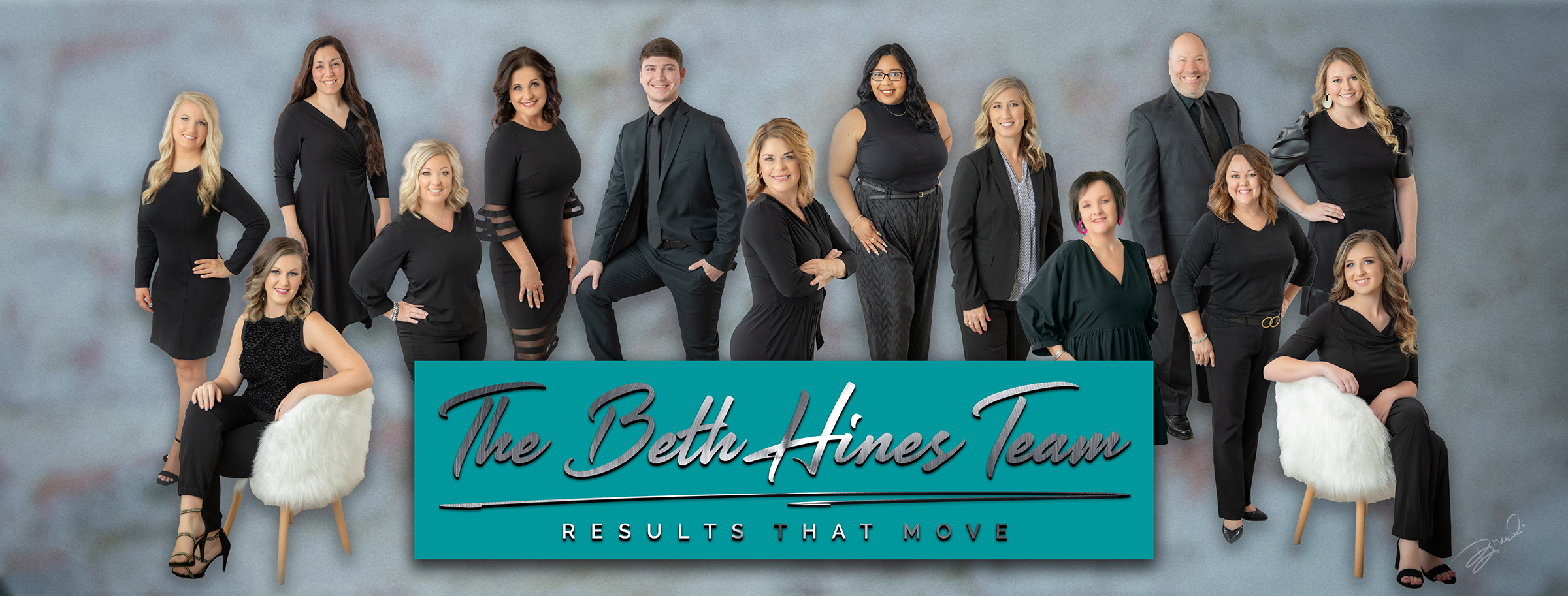 Beth's team with logo in front