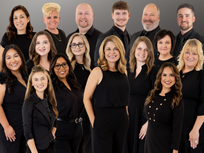 Beth's team with logo in front