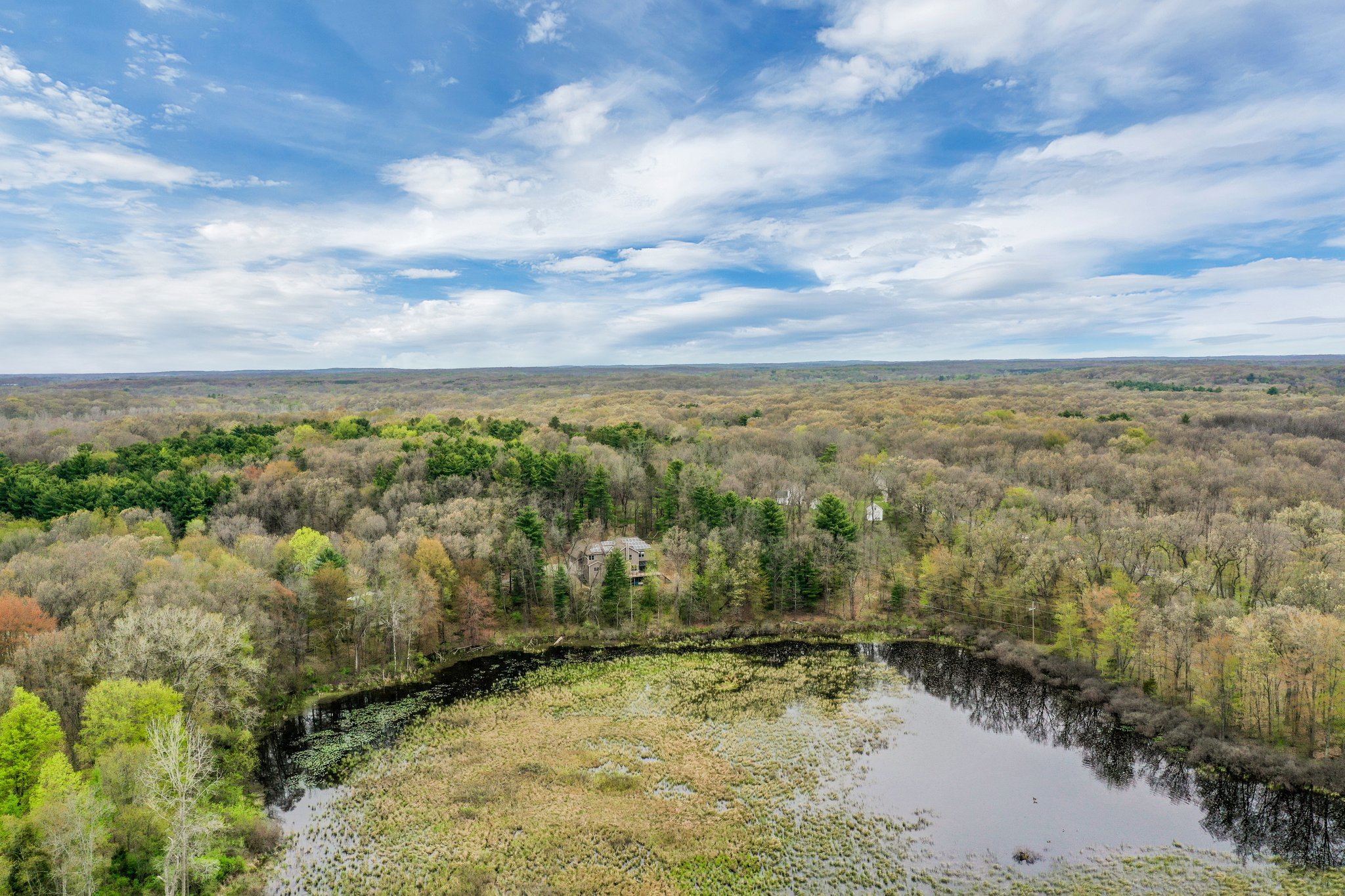 13725 S Rainbow Dr, Gregory, MI 48137. Enjoy privacy and water views on