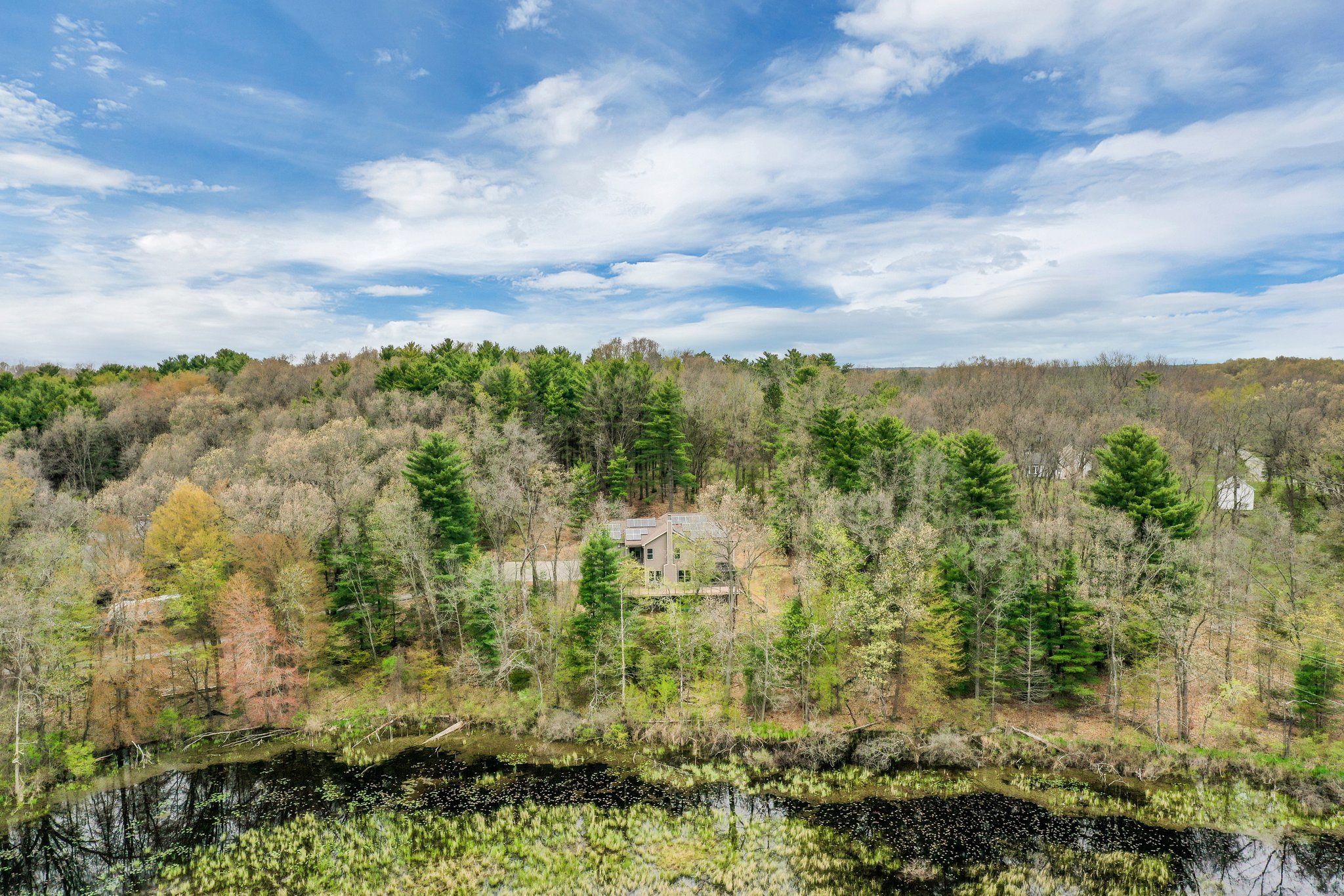 13725 S Rainbow Dr, Gregory, MI 48137. Enjoy privacy and water views on