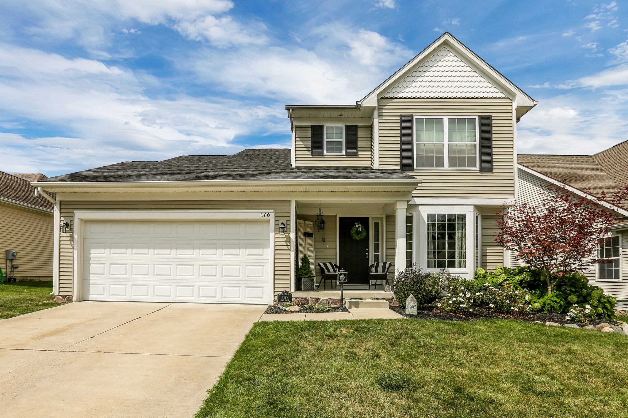 1160 Gene Drive, Chelsea, MI 48118. Contemporary Home in Quaint Neighborhood Walking Distance to