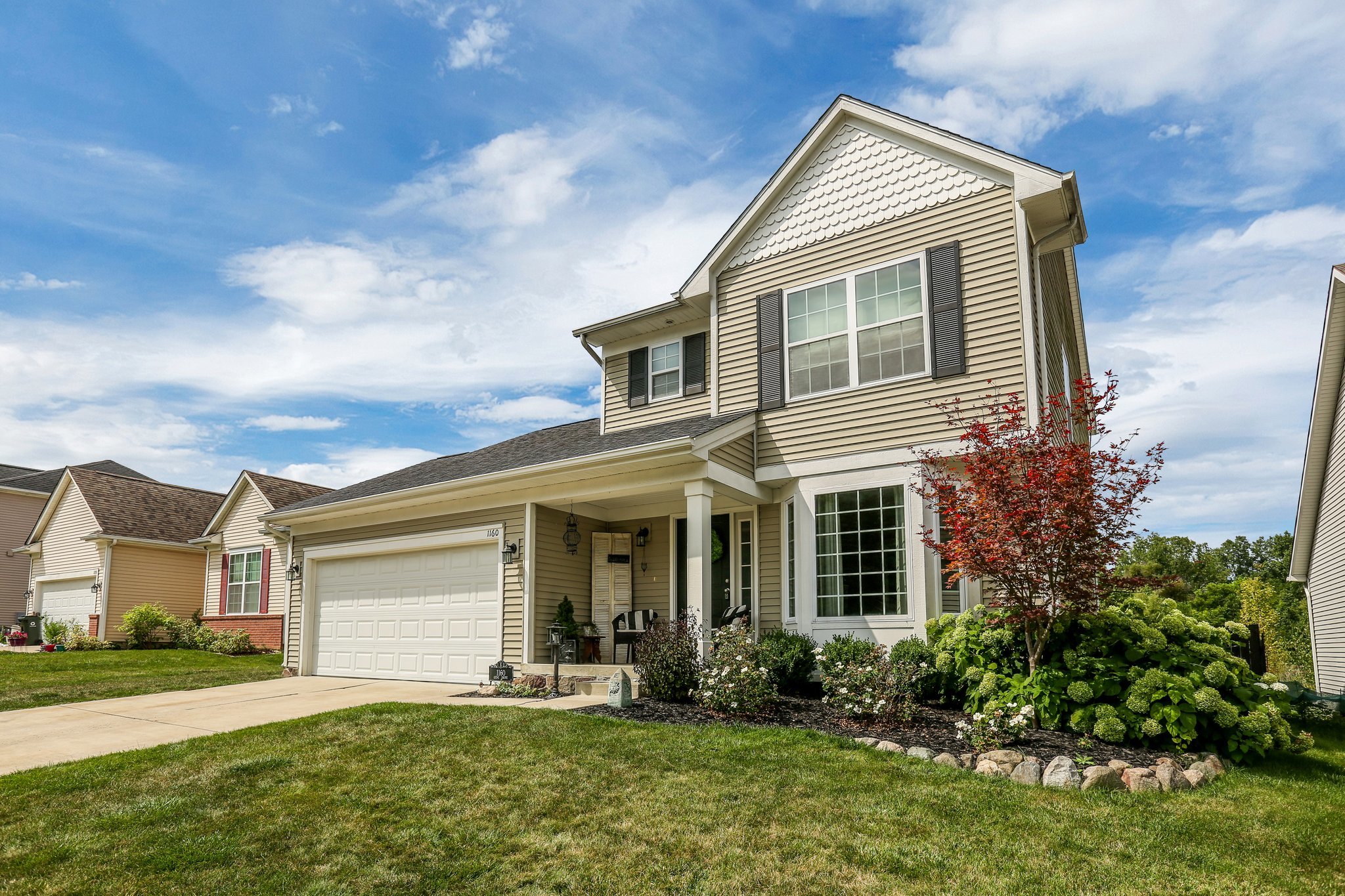 1160 Gene Drive, Chelsea, MI 48118. Contemporary Home in Quaint