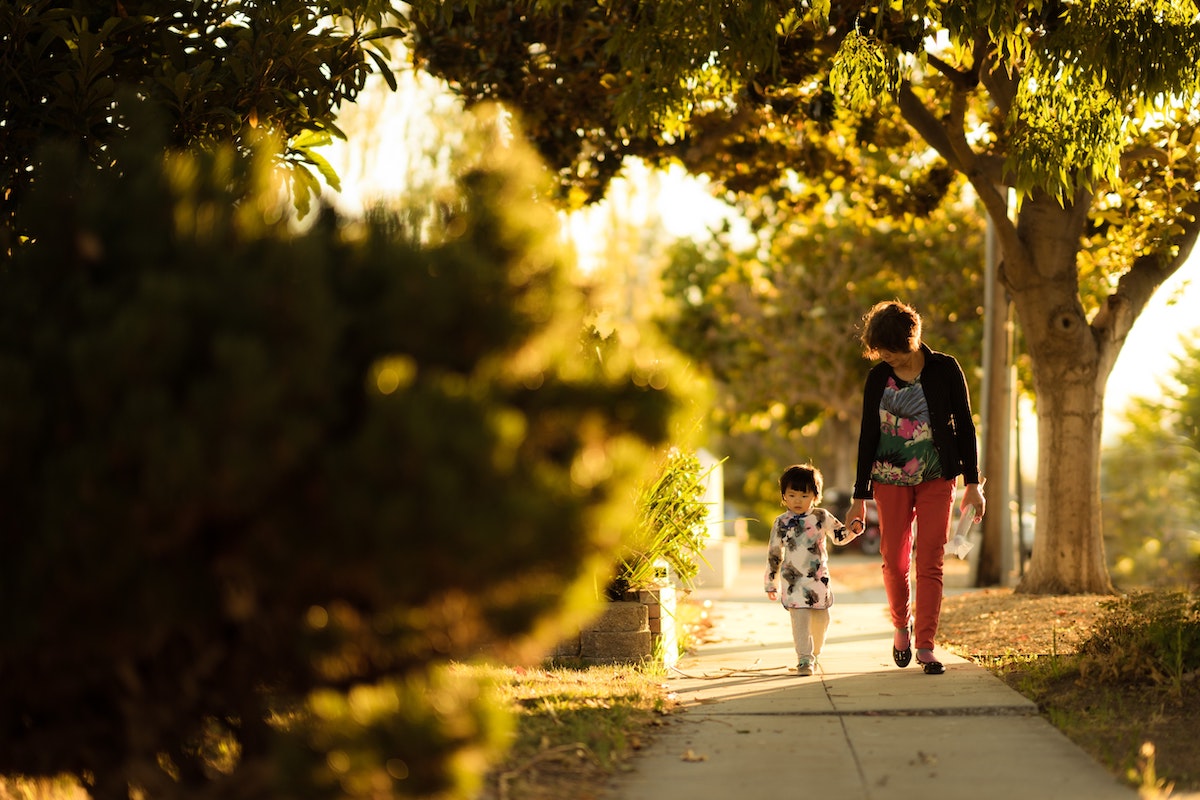 strolling on sidewalk