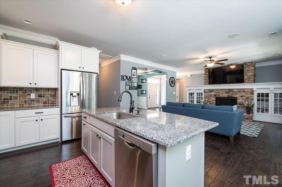 Kitchen with granite countertops in Cedar Creek Wendell NC Home