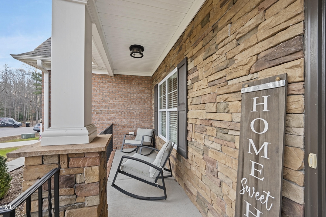A welcoming front porch in The Landing At Cooper Fields in Nashville NC