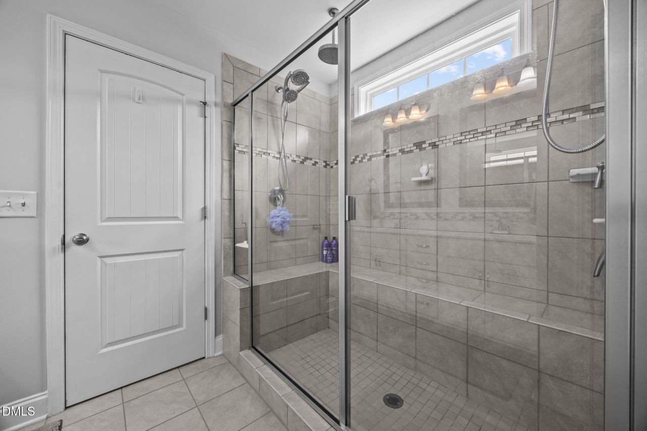 Walk-in Shower in the Primary Suite of a Weavers Pond Home