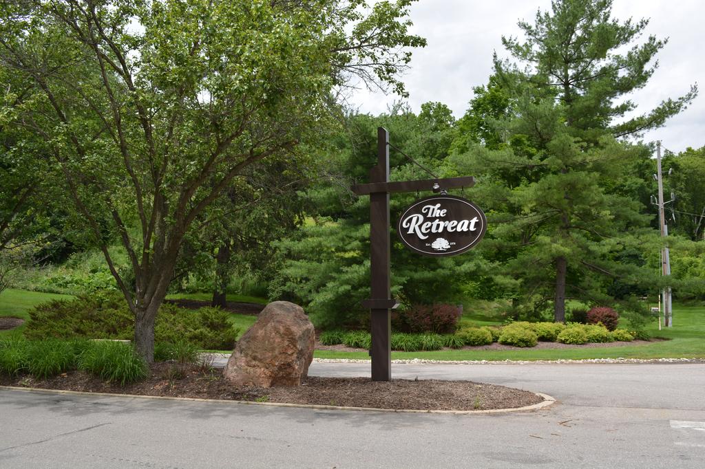 The Retreat neighborhood entrance sign