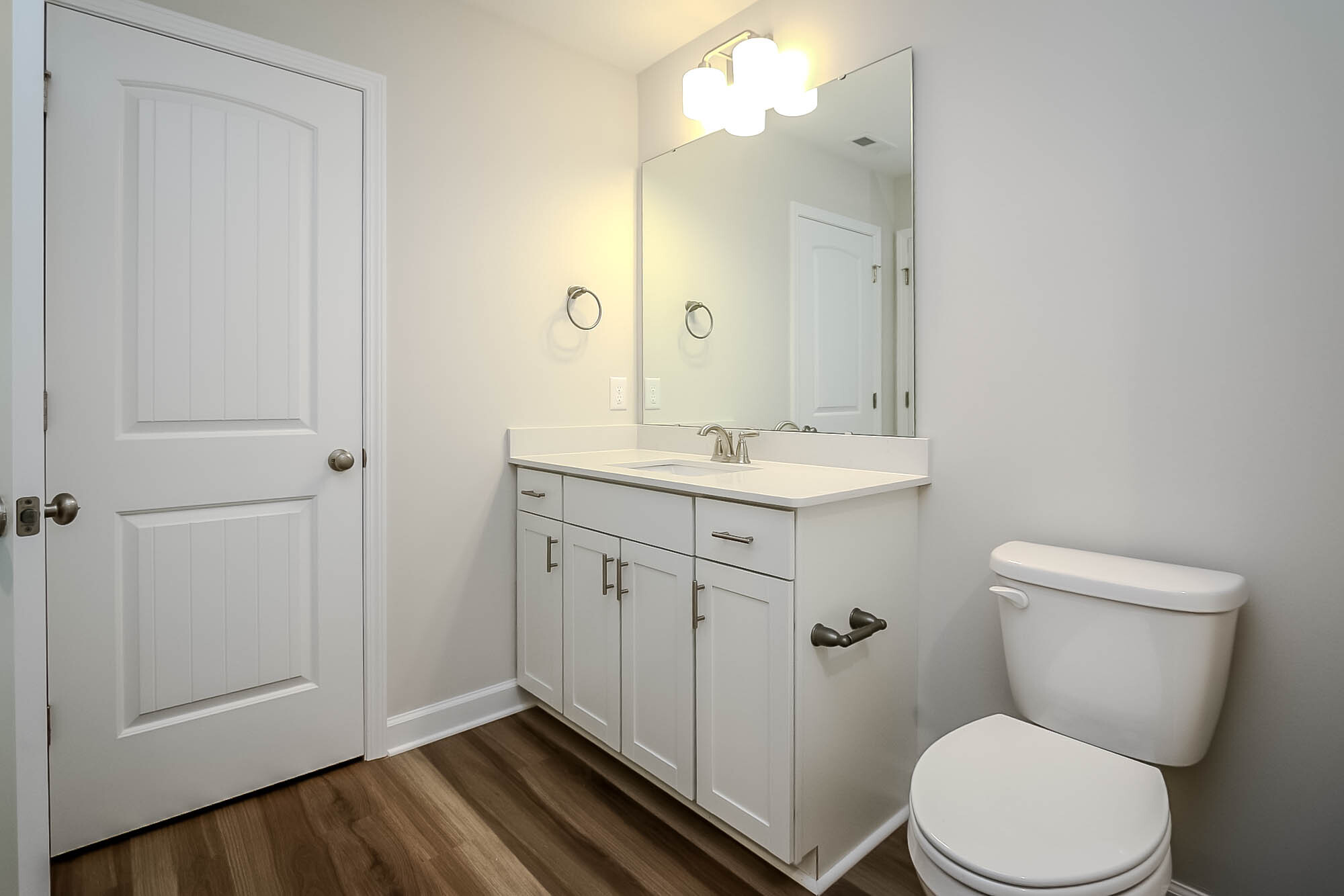 Second full bathroom upstairs with linen closet