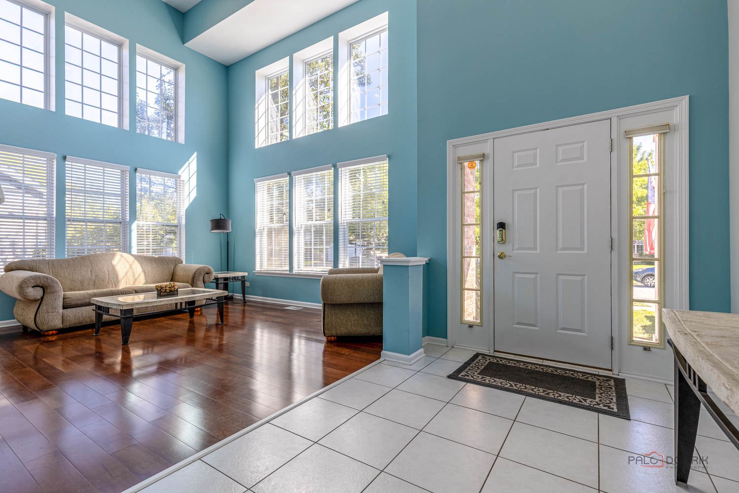 Two-story foyer with tall windows