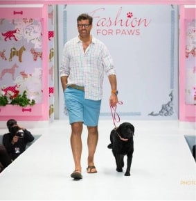 Jeff Wilson walking a dog