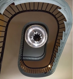 Looking down at a spiral staircase