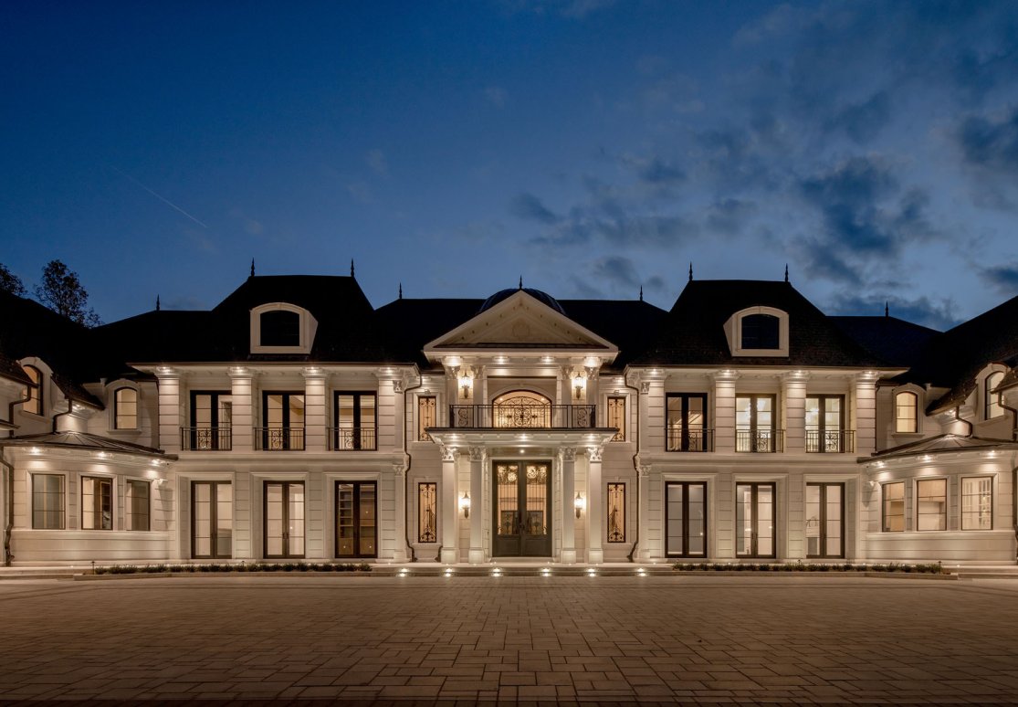 An elegant luxury mansion at night