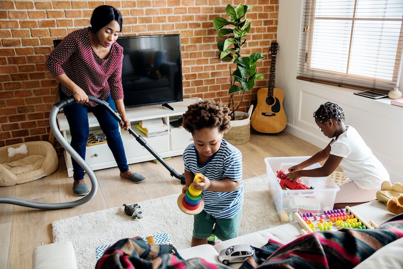 A mother and children cleaning