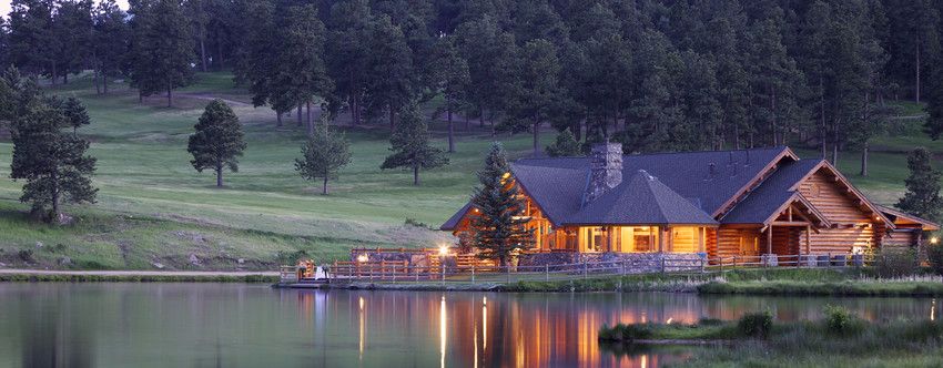 stunning log cabin estate on a lake in grand forks