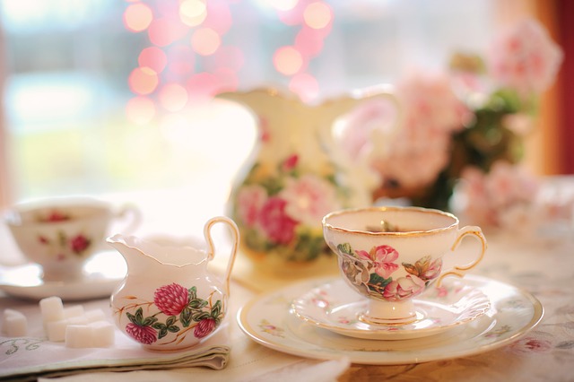 tea set on a table in a garden