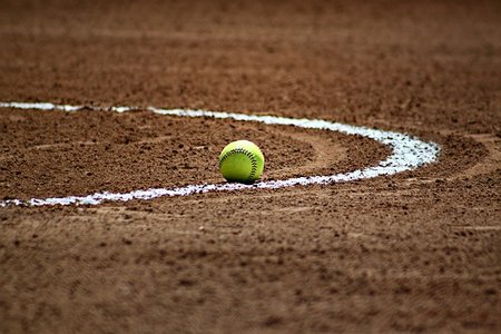 softball on a field in a park