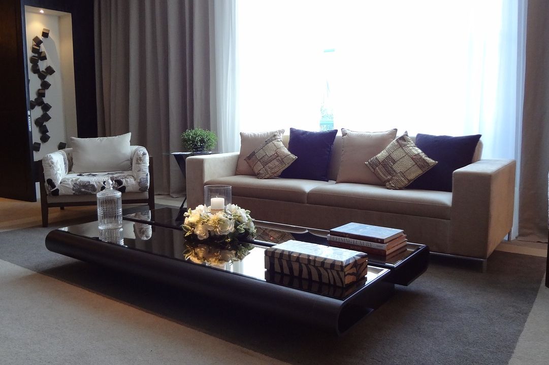 luxury living room with candles on table