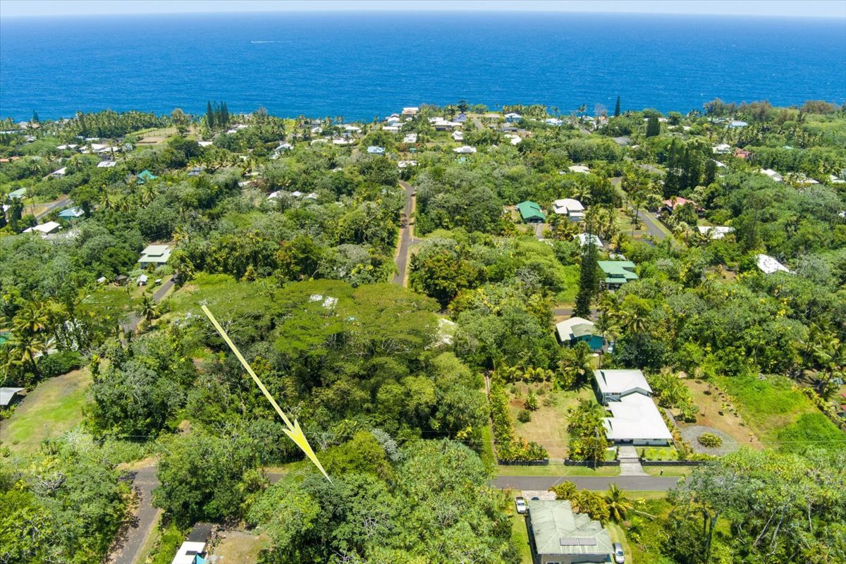 The adjoining lot is listed see MLS#723497 with seller financing options