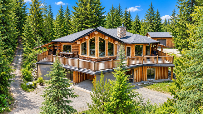Private 15.33-acre Canim Lake, BC property with unfinished log home, finished lower level, workshop, storage buildings and Crown land next door. 3561 Canim-Hendrix Lake Road , Canim Lake, British Columbia V0K 1L0