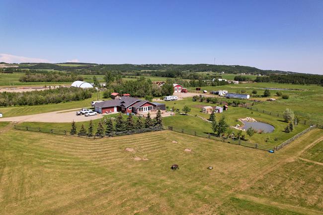 Introducing a Rare Gem: Your 75-acre Luxurious Estate in Fort St. John! Estate with Dual Homes, Dream Workshop, and Boundless Amenities!