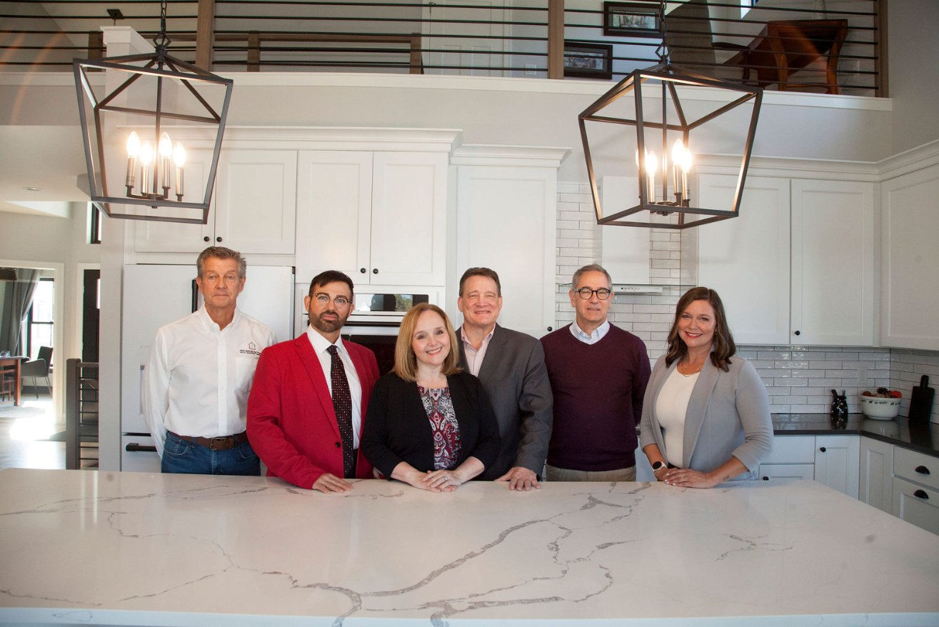 The Picknell Team in a modern kitchen