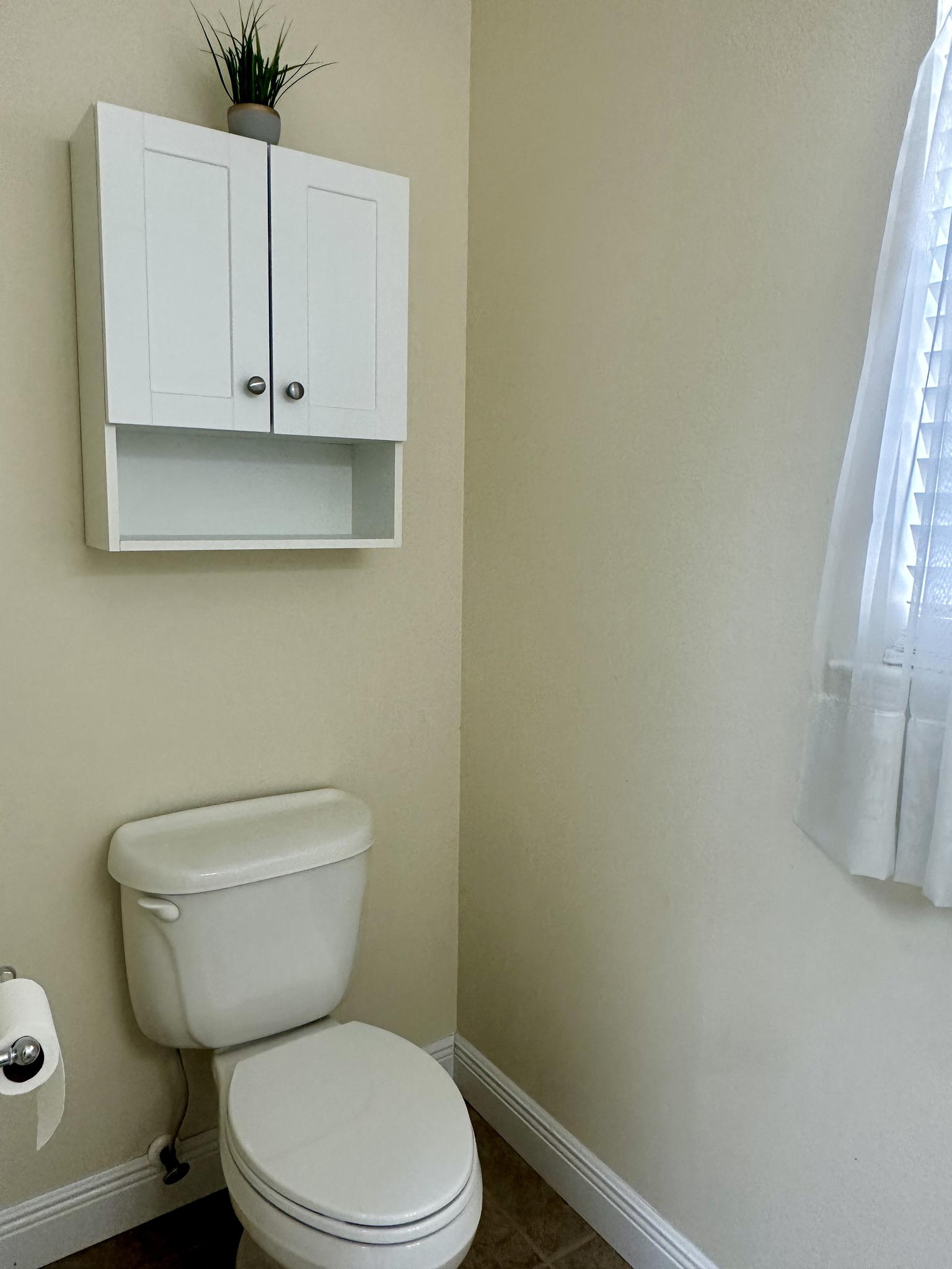 Half bathroom in laundry room